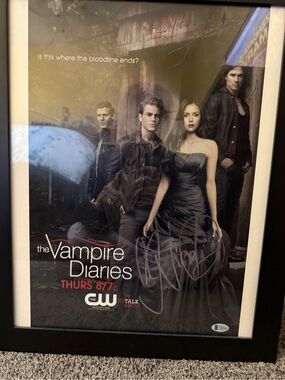 The vampire diaries poster signed by Nina dobrev